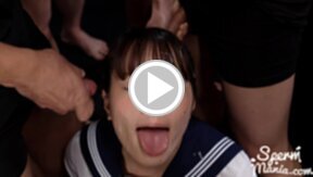 Kogal Komatsu Aya in uniform surrounded by men bukkake facial cumshots